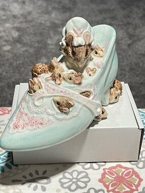 vintage Schmid Beatrix Potter "Little Old Woman Who Lived in a Shoe" music box.